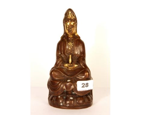 A Chinese bronze figure of the goddess Guanyin, H. 21cm.