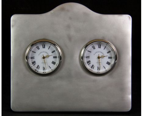 A hallmarked silver double dressing table clock, W. 11cm, H. 10cm.