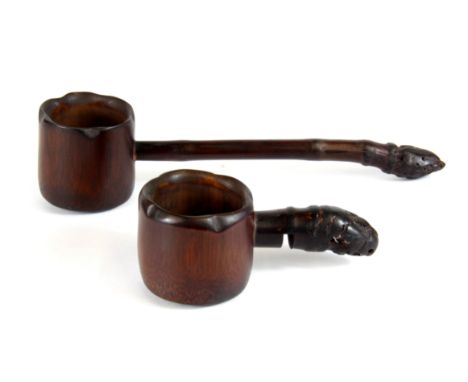 Two interesting Chinese carved bamboo items, a cup edge tea strainer and a wooden ladle, L. 22cm.