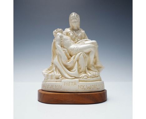 This "Pieta" sculpture commemorates its display at the Vatican Pavilion during the 1964-65 New York World's Fair. It portrays