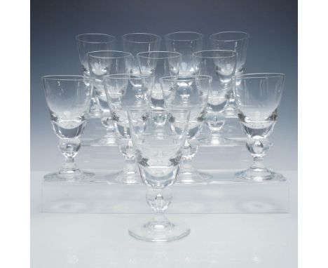 Set of twelve Steuben crystal water goblets, each finely crafted with the companys signature clarity and elegant modernist fo