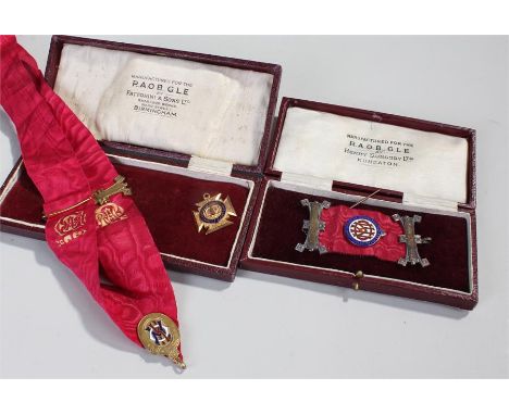 Two medals for the Royal Antediluvian Order of Buffaloes, one with neck ribbon and in cross form, the other a ribbon with sus