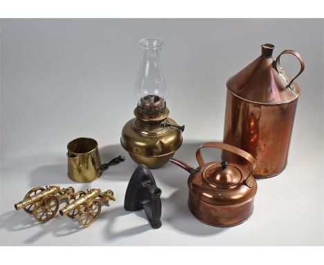 A mixed lot of Copper and brass to include, a brass Oil Lamp, a pair of ornamental brass cannon, a brass ladle/jug, a copper 