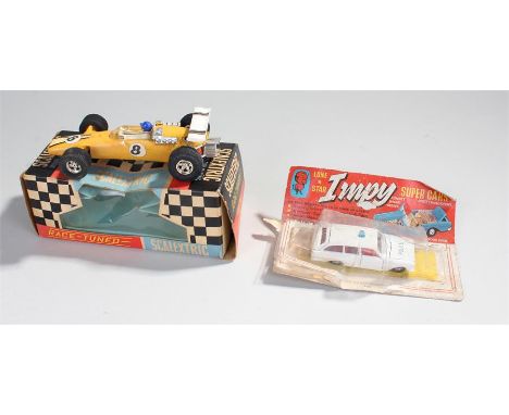 Scalextric 1 C6 Panther, boxed, together with a Lone Star Impy police car, (2)