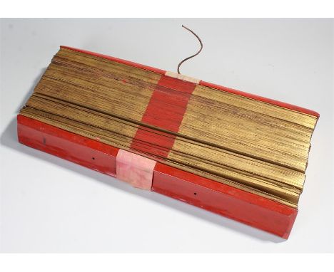Antique Burmese Buddhist  prayer manuscript, well over one hudred palm leaf pages edged in gilt, bound with leather thongs an