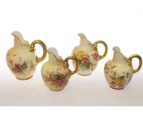 Four Royal Worcester flat-back jugs, tallest 13cm