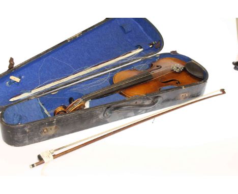 Vintage violin and two bows
