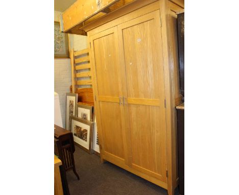 Light oak two door wardrobe and pine double bedstead (2)