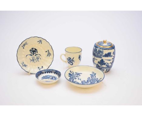 A group of Caughley porcelain, circa 1775-85comprising a 'Fisherman' egg drainer, unmarked, 8.2cm wide; a 'Bell Toy' saucer, 