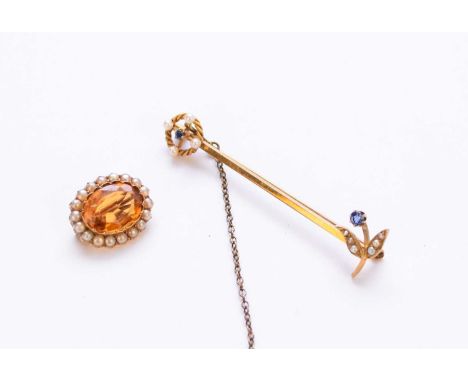 A seed pearl and sapphire set bar brooch, stamped '14', 60mm long, together with a citrine and seed pearl set oval cluster br