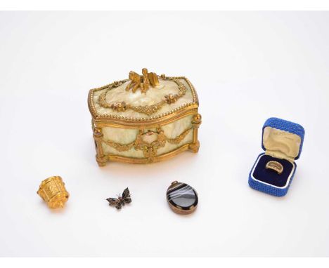 A 19th century seed pearl and black enamel mourning ring, the reverse engraved 'REB', size M, together with a gilt thimble ca