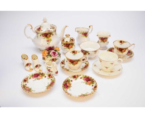 A Royal Albert Old Country Roses tea service comprising six teacups, six saucers, six sideplates, teapot and cover, cream jug