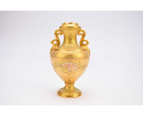 A Coalport jewelled vase, late 19th/early 20th century, of twin-handled form, the overall gilt ground painted with a panel of