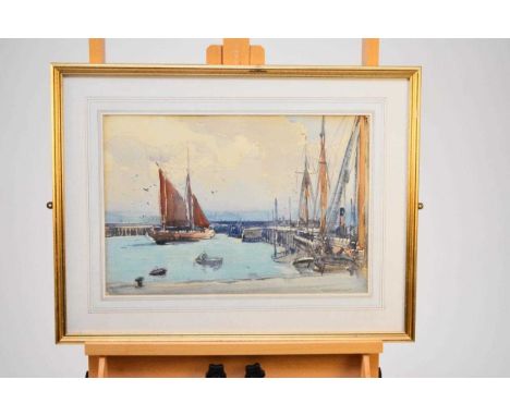 Arthur Henry Knighton-Hammond (British 1875-1970) Boats in a Harbour, signed lower right, watercolour, measurements 33.5 x 49