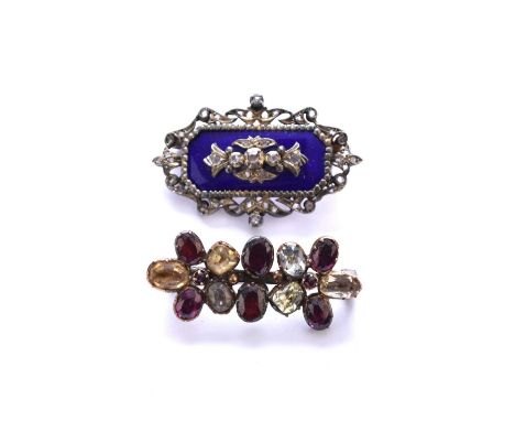 A Victorian style blue enamel and rose cut diamond set brooch, of rectangular form with decorative engraved reverse, 40mm wid