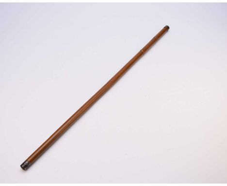 A novelty, 'eating irons', cane walking stick, segmented with toothpicks concealed by the handle, and the lower two sections 