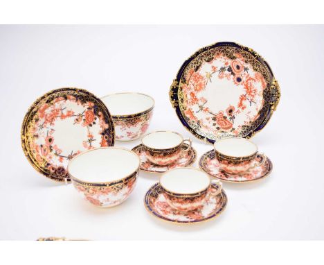 A Royal Crown Derby imari tea service, dated 1911, pattern 5852, comprising ten teacups, ten saucers, eleven sideplates, 17.5