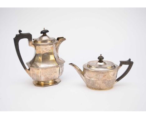 A Victorian silver teapot, Holland, Son &amp; Slater, London 1880, of oval half reeded form with bright cut engraved decorati