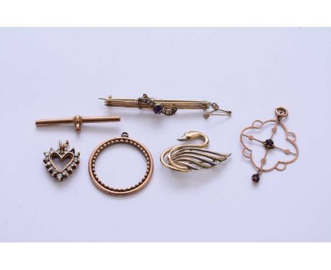 A small collection of jewellery, comprising; an early 20th century seed pearl and amethyst bar brooch, stamped '9ct', weight 