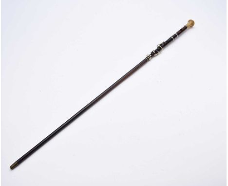 An early 20th century novelty 'flute', rosewood walking stick, with a domed top horn handle and in three sections with EPNS m