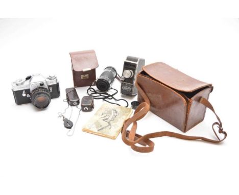 A Leicaflex 35mm SLR camera, with Leitz 50mm lens and leather case, together with a Minox mini camera with exposure meter and