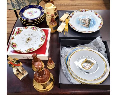 A Royal Albert Old Country Roses pattern wall clock in original box, five Bell's Whisky bottles, Whyte &amp; Mackay jug, a bi