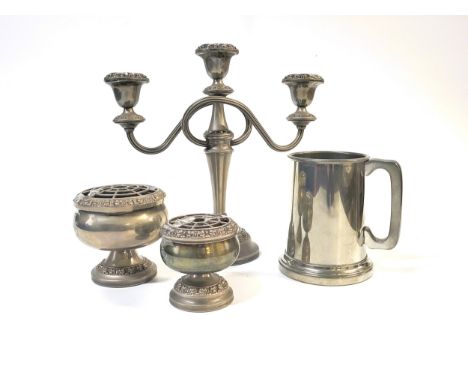A silver plate candelabra, and two rose bowls, and a pewter tankard. (4)