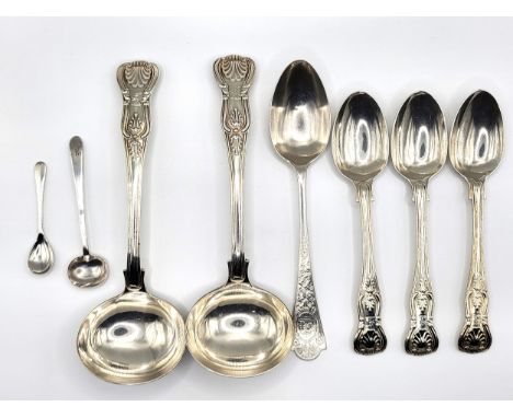 A collection of silver spoons including a monogrammed spoon with foliate design back and front,  Martin, Hall &amp; Co (Richa