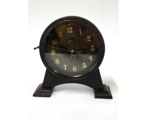 A metal mantle clock.26 x26cm