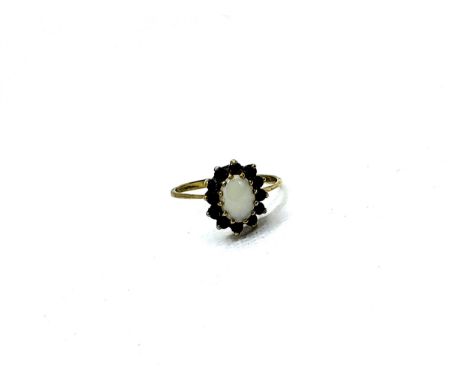 A 9ct yellow gold opal and sapphire ring 2.1gms size Q
