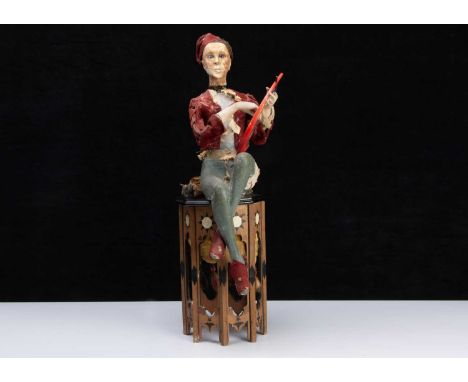 A rare Gustave Vichy automaton of a Moroccan Harpist, with papier-mâché head, brown glass eyes, papier-mâché body with crosse