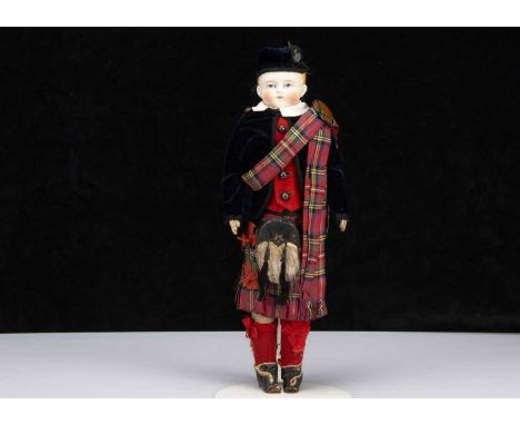 An Alt, Beck & Gottschalck bisque shoulder-head Scots boy doll,  with head turned slightly to the right, blue painted eyes, r