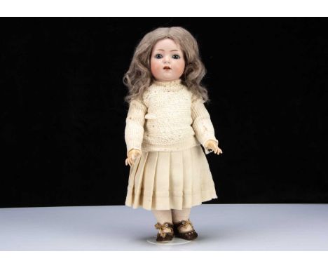 A Kammer & Reinhardt 121 character toddler girl doll,  with blue sleeping eyes, dimpled chin, original light brown mohair wig