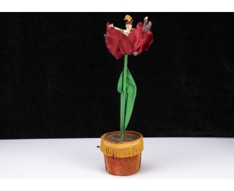 A rare Roullet & Decamps tulip musical automaton,  the single fabric tulip on a velvet covered flower pot, with child seated 