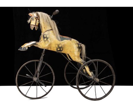 A rare G & J Lines Bicycle Horse or Velocipede circa 1910, carved and painted dappled wooden horse with glass eyes and horse 