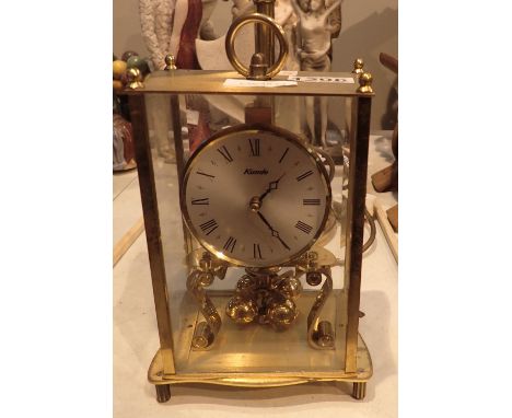 Kundo brass and glass panelled carriage clock and a brass scallop formed lamp. Not available for in-house P&amp;P, contact Pa