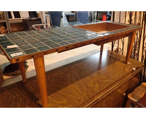 1970s tile top coffee table with metal well. Some dents to wooden legs, removable drop in metal tray is partly rusted. Not av