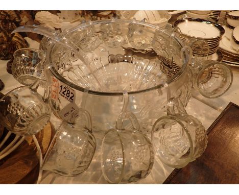 Glass punch bowl with twelve cups and ladle. Not available for in-house P&amp;P, contact Paul O'Hea at Mailboxes on 01925 659