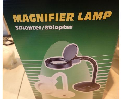 New and boxed 3/8 magnifier lamp. P&amp;P Group 2 (£18+VAT for the first lot and £3+VAT for subsequent lots) 