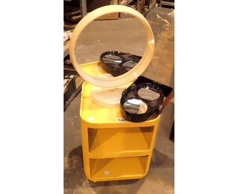Yellow two shelf storage box on castors made by Kartell designed by Castelli for Habitat in the 1980s plus two vintage mirror