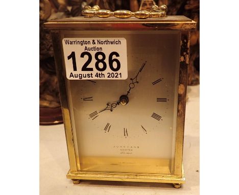Junghans Meister Ato-mat brass battery powered carriage clock. P&amp;P Group 2 (£18+VAT for the first lot and £3+VAT for subs
