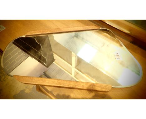 Mid 20th century teak framed shaped mirror, H: 60cm. Not available for in-house P&amp;P, contact Paul O'Hea at Mailboxes on 0