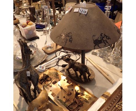 African wildlife items including a pair of carved soapstone giraffes, two carved wooden warthogs and a warthog table lamp etc