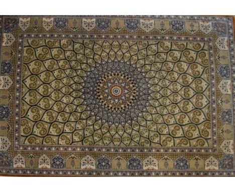 A fine quality silk Caucasian rug, late 20th Century
The central panel with medallion, with outer multi-faceted diamond decor