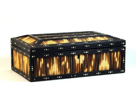 A late 19th century Anglo Indian inlaid ebony and porcupine quill box
Of rectangular form, the cover enclosing an inlaid pane