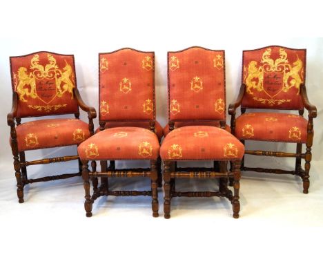 A set of six 18th Century style oak framed dining chairs, Royal Oak Furniture, Yorkshire, 20th Century
The two carvers and th