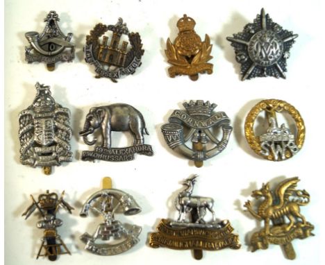 A collection of approx 100 British Army cap badges 
To include the artists rifle, Intelligence Corps, Kings own Malta Regimen