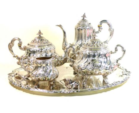 A late 19th century fine quality French silver five piece tea service
Comprising teapot, hot water pot, twin handled lidded s