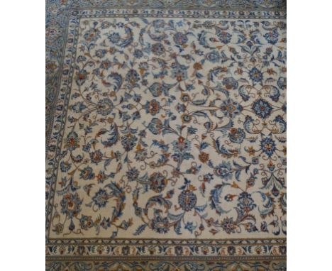 A large Caucasian style rug on a mainly beige ground, 20th Century
The Central panel with extensive foliate decoration flanke