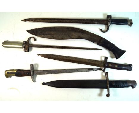 A collection of five bayonets and kukri knife
To include a Spanish Bolo bayonet, with 25cm blade, chequered grips, complete w